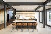 Modern home with Kitchen, Travertine Floor, Wood Cabinet, Refrigerator, Recessed Lighting, Undermount Sink, Open Cabinet, and Range. The open plan brings the outside in with unlimited access to the stunning surroundings. Photo 18 of Joya Villas