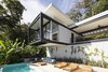 Modern home with Outdoor, Gardens, Trees, Back Yard, Large Patio, Porch, Deck, Raised Planters, Swimming Pools, Tubs, Shower, and Planters Patio, Porch, Deck. A peaceful poolside vignette at Casa Bri Bri. Photo 5 of Joya Villas