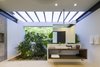Modern home with Bath Room, Wall Mount Sink, Wood Counter, Slate Floor, Vessel Sink, and Recessed Lighting. The bathroom integrates a sense of the outdoors. Photo 12 of Joya Villas