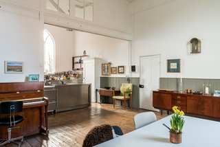 The kitchen is set off the main living space.