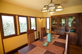 A view of the built-in storage cabinet in the dining room