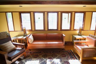 Art glass windows preside over the living room. 