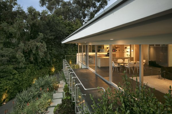 Originally designed as a single story residence the home features clean lines and an indoor-outdoor connection.