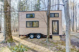 The Mohican from Modern Tiny Living is made by Amish craftsmen in Ohio and can be built in as little as eight weeks. This 20' tiny home has an unfinished contemporary exterior and a bright minimalist interior that packs all the essentials into a compact footprint and retails for only about $59,000.