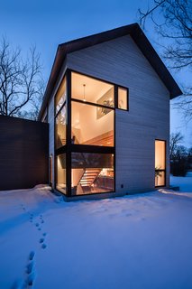 Large-scale picture windows also help maximize the home's access to natural sunlight. 