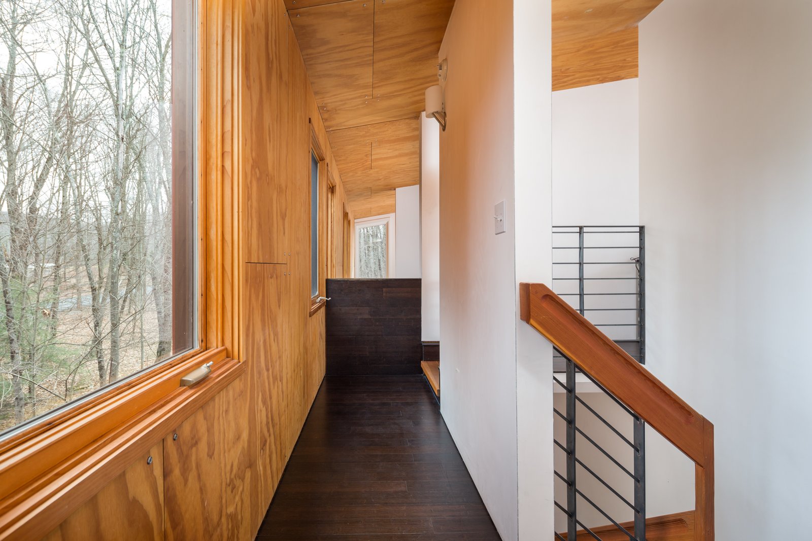 The large windows bring in so much natural light that the home rarely needs electrical lighting throughout the daytime.