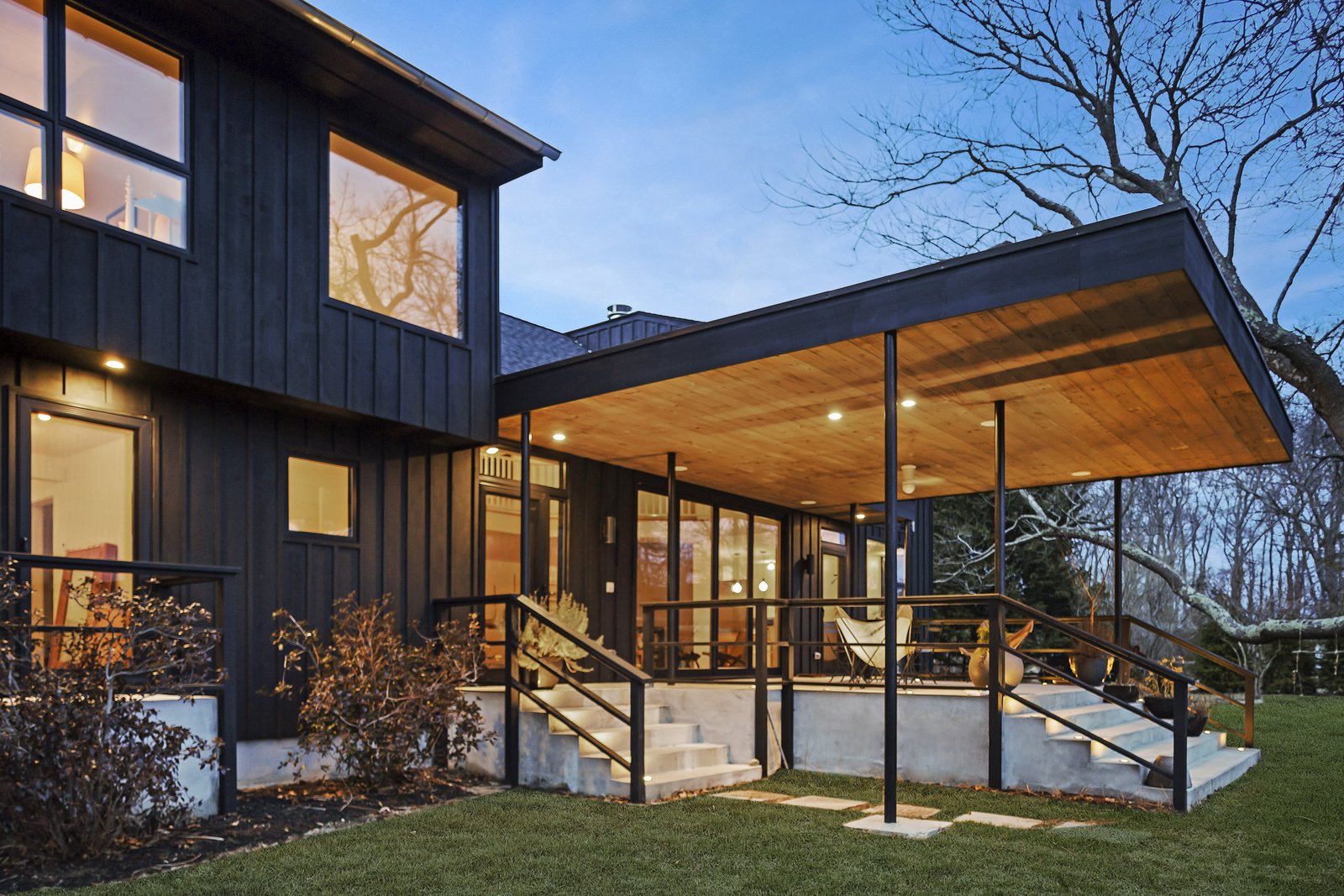 A small patio overlooks the swimming pool.