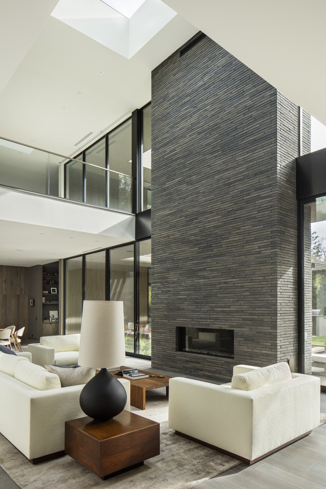 two sided fireplace indoor outdoor family room on Photo 19 Of 28 In Living Two Sided End Tables Photos From Live Large In This Marmol Radziner Designed Home That S Asking 16 9m Dwell