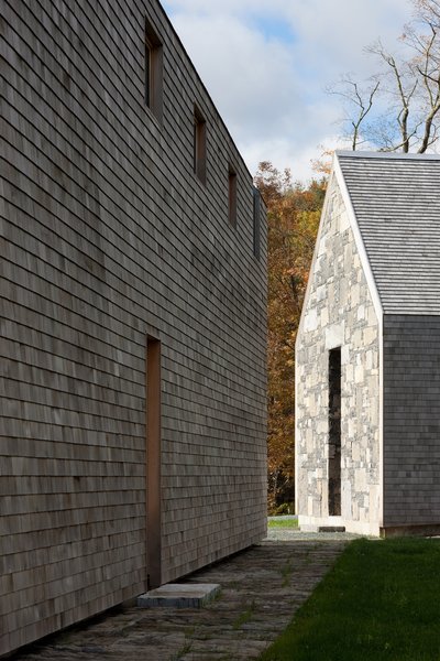 The design of the 3890-square-foot main residence and its adjacent barn have been executed with the highest degree of craftsmanship and attention to detail, drawing from traditional influences and the vernacular of the rural northeast.