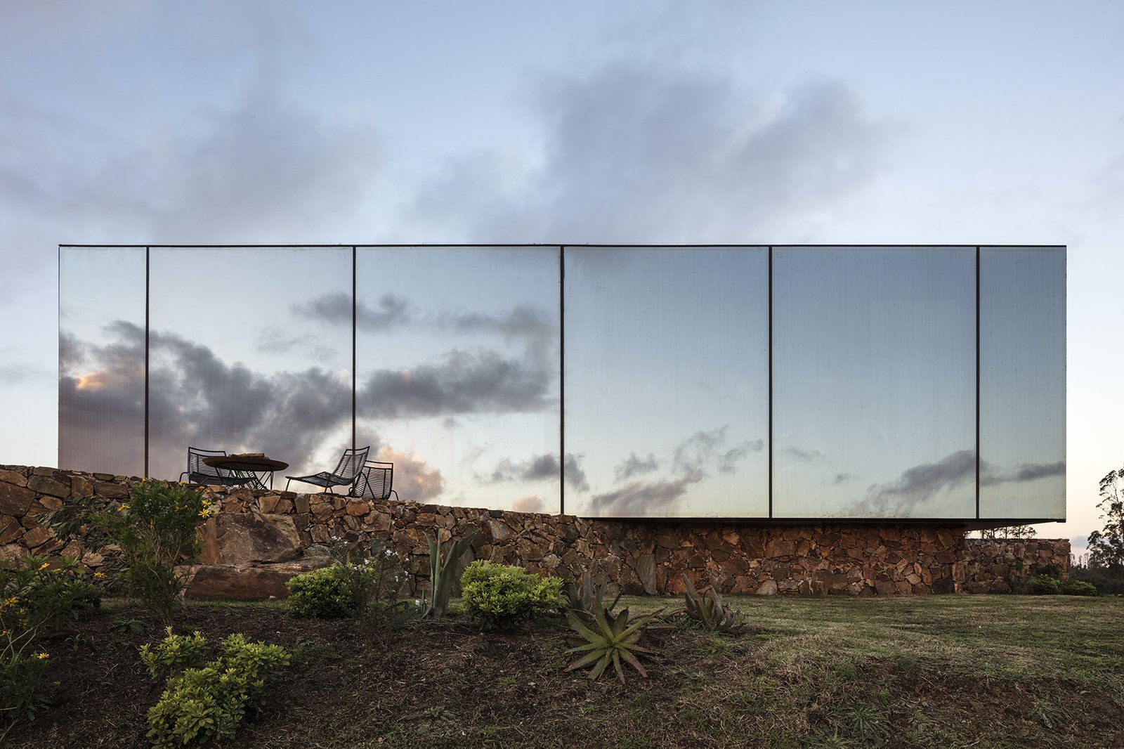 In addition to the use of prefab construction for minimal site impact, the modular steel-framed cabins are also fitted with low-E glass, green roofs, and are connected to an eco-friendly wastewater treatment system.  