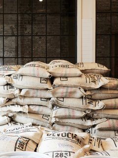 Devoción uses fair-trade coffee beans that are sourced from hand-selected Columbian farms. The beans are dry-milled in Bogota, and shipped to the USA via FedEx for roasting. 