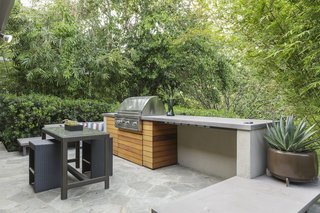 The barbeque area sits just off the kitchen and features built-in seating.