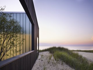 Here is a look at the colors of the beach at dusk against the charred timber exterior. 

