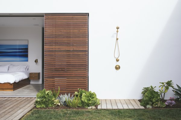 With the home being located just minutes from the beach, the outdoor shower from Kohler's Purist collection is a perfect spot to rinse off after excursions. 

