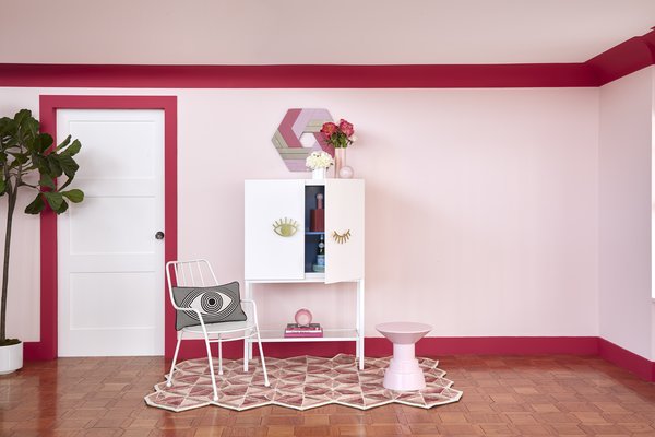 The Eye-Con Bar Cabinet is part of the cheeky "Wink of Pink" collection. 

