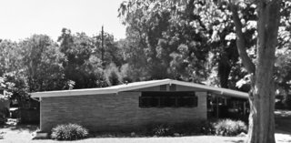 The original brick facade had very few windows, making for dark interiors. 