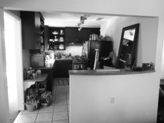 The kitchen had been updated, but it was dark and cramped. 