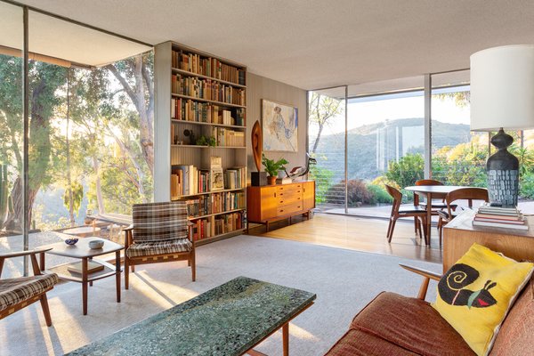 The home features built-ins like this bookshelf in the living space.