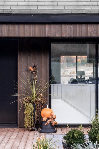 The 4,672-square-foot home includes six bedrooms, two family rooms, four bathrooms, and three garage spaces—primarily located on one level.