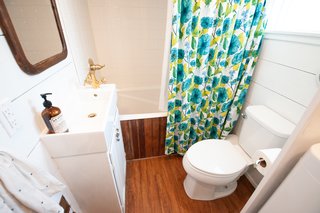 The tiny bathroom sits on a small footprint, but it has everything that the mother-daughter duo needs. 