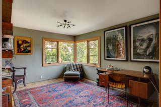 An additional bedroom or office space is just off the kitchen. 