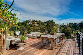 One more level down is a spacious deck that boasts 270-degree views of the canyon. 