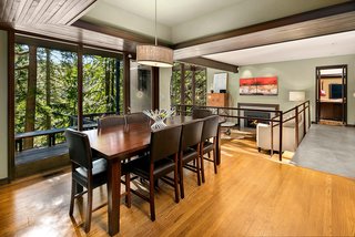 The dining area overlooks the sunken living room.