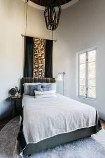 The bed was placed just under the turret. 