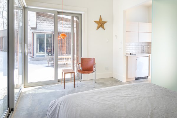 Best 60 Modern Bedroom Concrete Floors Design Photos And Ideas Dwell The Interior Of Guest Cottage