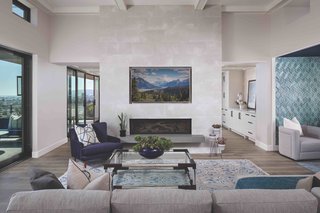 Originally, the kitchen was in the center of the house disrupting the flow between the dining room and the living room. Flipping the rooms allowed for the addition of the fireplace in the great room. 