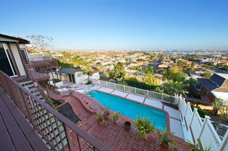 The existing pool was two levels below the living space and felt disconnected from the house.