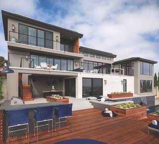 The multi-slide doors on the lower level connect the house to the pool with functional decks and terraces, achieving a modern look and reinforcing the indoor/outdoor lifestyle. 