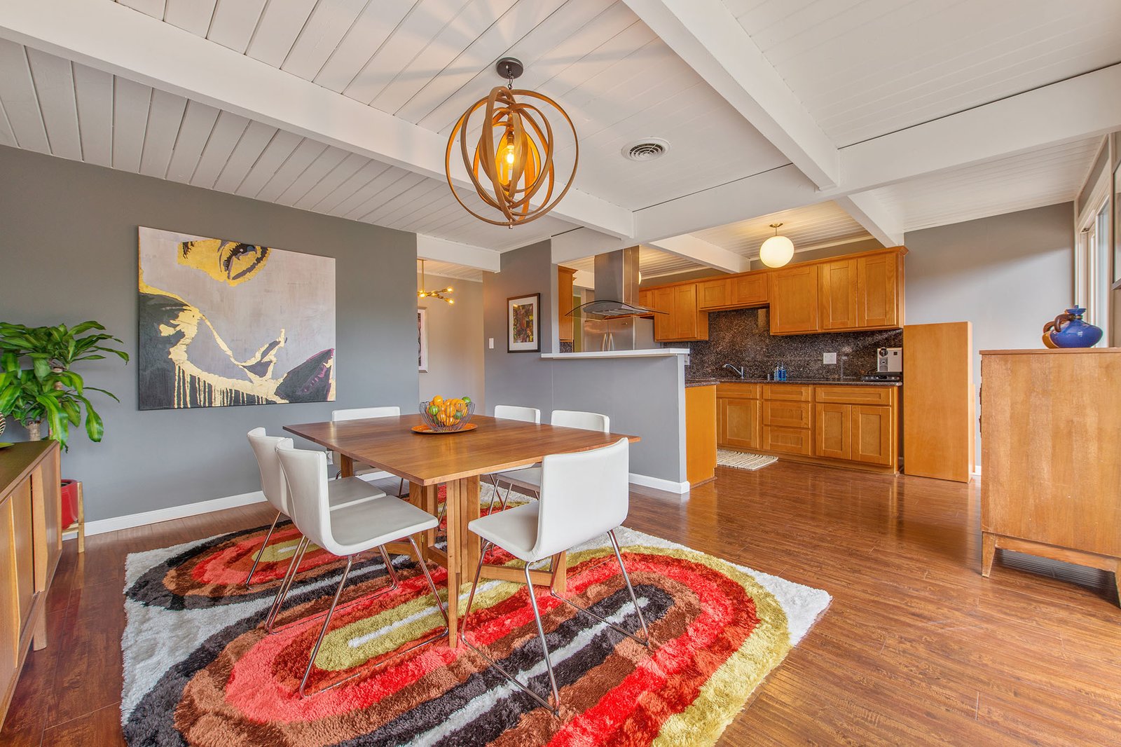 The kitchen and dining room feature an open-plan layout.