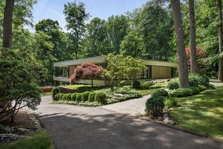 The beautifully landscaped front yard of 9 Tallwoods Road.