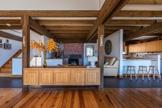 The beamed ceiling has a rustic, contemporary feel.