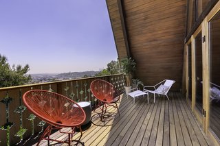 The porch features spectacular views of the canyon and downtown Los Angeles.