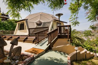 Perched on the hillside overlooking the main home, the geodesic dome offers stellar panoramic views that stretch all the way out to the San Gabriel Mountain range.