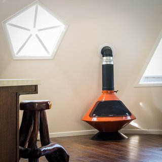 A bright orange stove keeps the interior toasty.