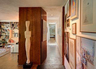 A hallway leads to the family's private space. 