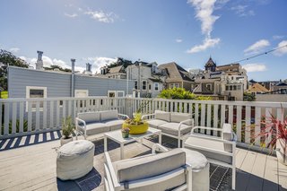 The home also has a private rooftop deck with city views.