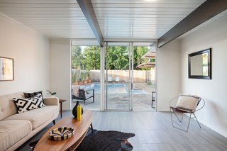A den overlooks the pool area.