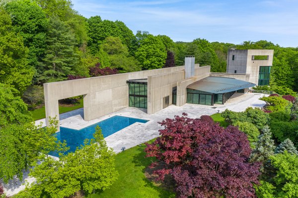 The five-acre hilltop locale is surrounded by trees and shrubberies with the original landscaping costs estimated to be approximately $3m, according to the listing agent.