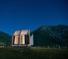 Modern home with Exterior, Tiny Home Building Type, Gable RoofLine, Wood Siding Material, and Cabin Building Type. Immerso Glamping, a 65-square-foot prefab structure designed by Italian architects Fabio Vignolo and Francesca Turnaturi, is located in the Piedmont region of Italy. With a simple palette of birch plywood and plexiglass, the cabin was inspired by the architects’ experience designing easy-to-assemble, flat-packed cabins for disaster relief. You can book it on Airbnb for around $90. Photo of Immerso Glamping Cabin