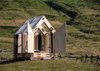 Modern home with Exterior, Wood Siding Material, Tiny Home Building Type, Gable RoofLine, and Cabin Building Type. Birch plywood panels, full-height windows and a transparent roof compose "Immerso Glamping Photo 2 of Immerso Glamping Cabin