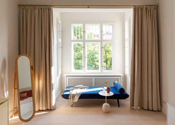 A window nook becomes the ultimate spot for relaxing with the addition of a Dick Cordemeijer for Auping "Cleopatra" daybed reupholstered in a rich Pierre Frey velvet. 