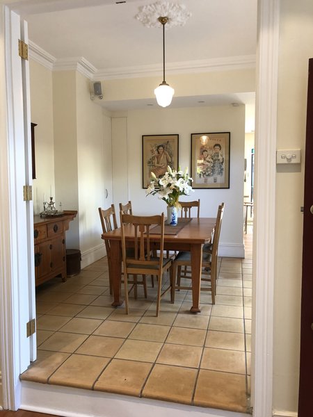 Before, the transition to the dining room was ordinary, and the space was traditional. 