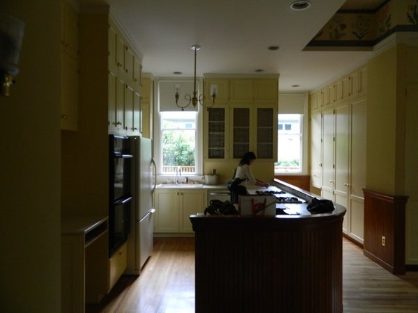Before the renovation, the kitchen had limited sources of natural light. "We were able to add windows above the kitchen sink, to the non-street-facing facade," shares Helgerson. "We had to submit a special application to the Historic Review Board to get that approval." 