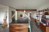 Modern home with Office, Craft Room Room Type, Shelves, Bookcase, Desk, Porcelain Tile Floor, and Chair. Art Studio Photo 4 of 51 Nebraska