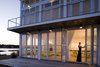 Modern home with Exterior and Beach House Building Type. Exterior shot of NanaWall folding glass wall system Photo 6 of Mulberry Point House