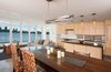 Modern home with Doors, Exterior, Metal, Wood, and Folding Door Type. Opening glass NanaWall system WA67, polished concrete floors, dining room table, pendant lighting, and living area Photo 18 of Houseboat H